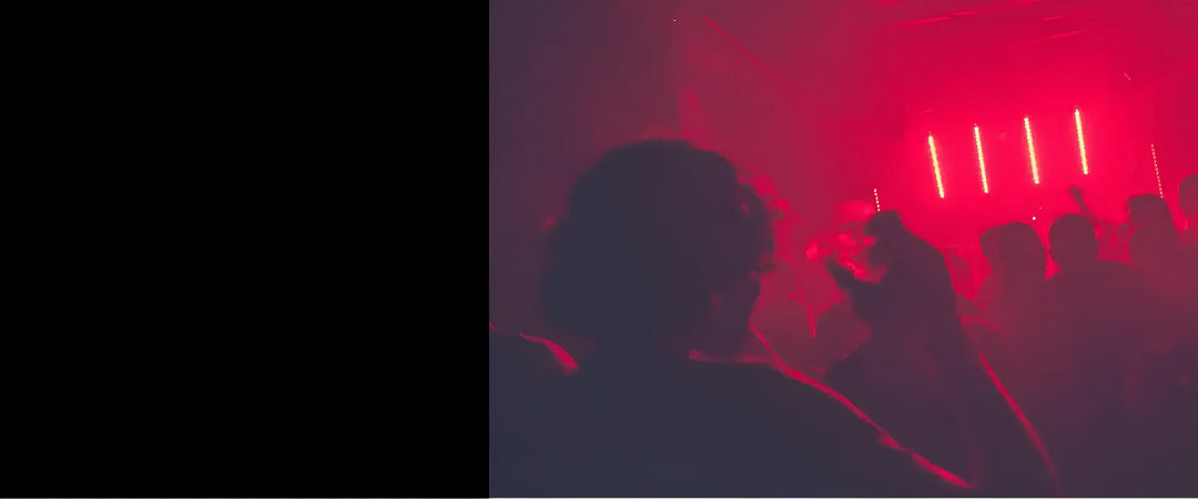 blurred image of students partying at a nightclub